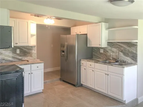 $1,320 | 305 Bougainvillea Road West, Lehigh Acres, FL 33936