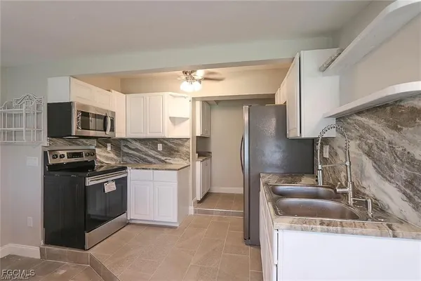 $1,320 | 305 Bougainvillea Road West, Lehigh Acres, FL 33936