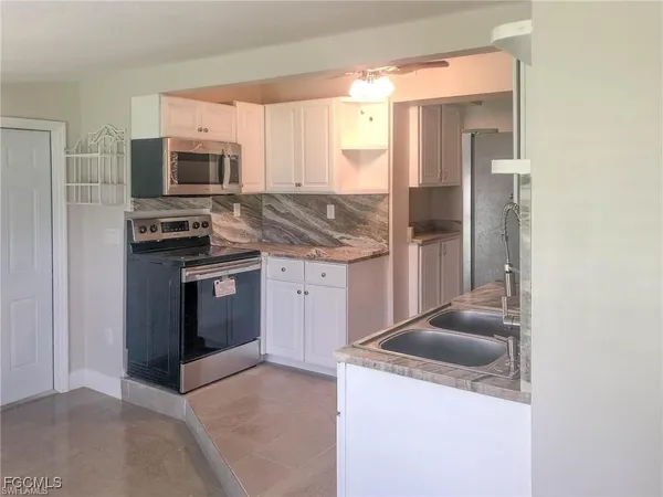 $1,320 | 305 Bougainvillea Road West, Lehigh Acres, FL 33936