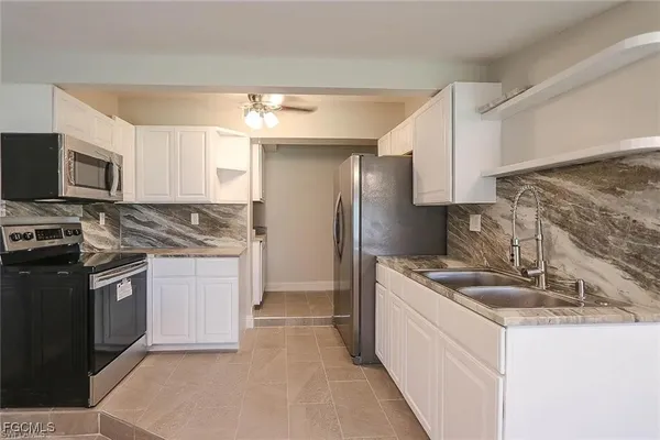 $1,320 | 305 Bougainvillea Road West, Lehigh Acres, FL 33936