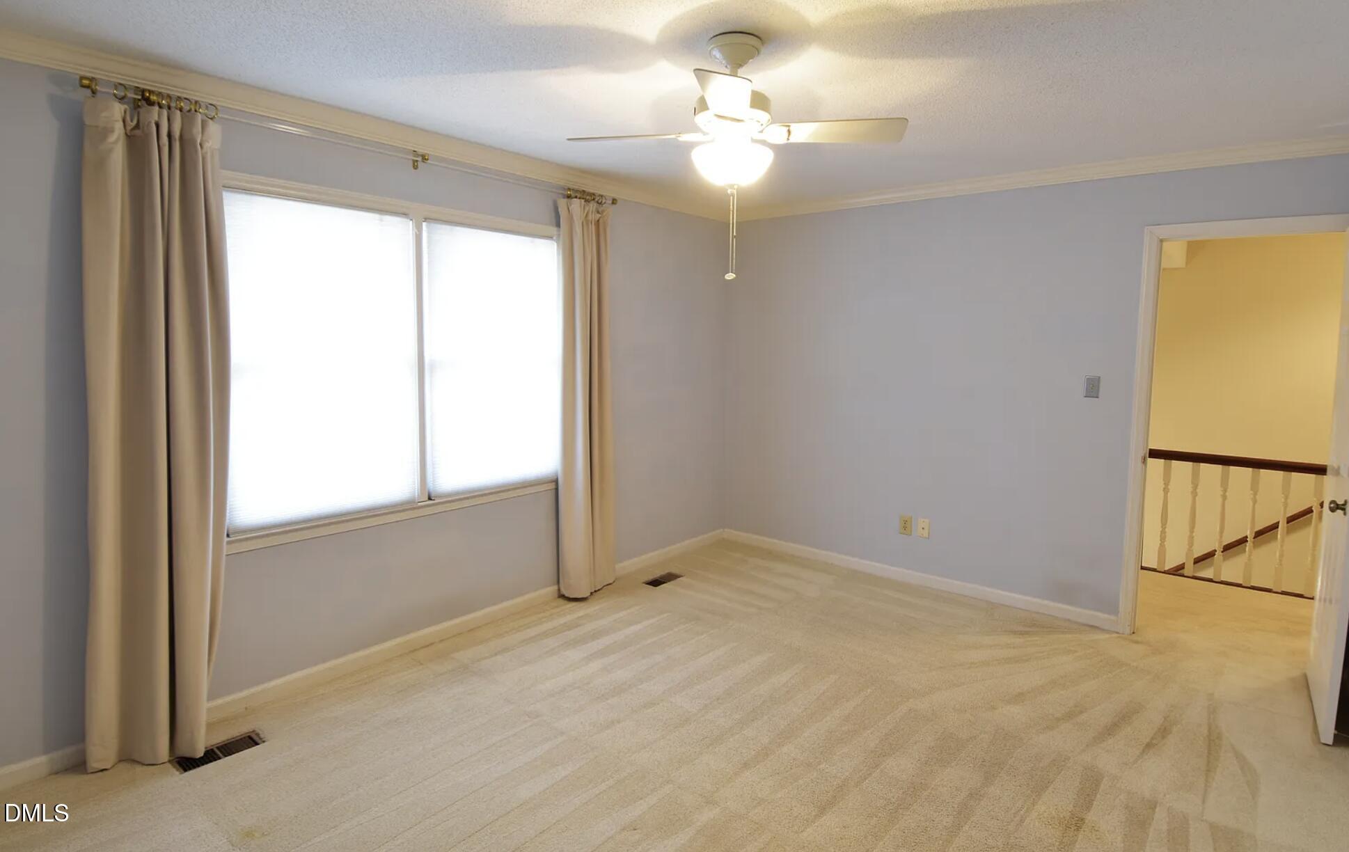 6403 Andsley Drive Raleigh, NC 27609 - Photo 17 of 21 a view of an empty room with a window