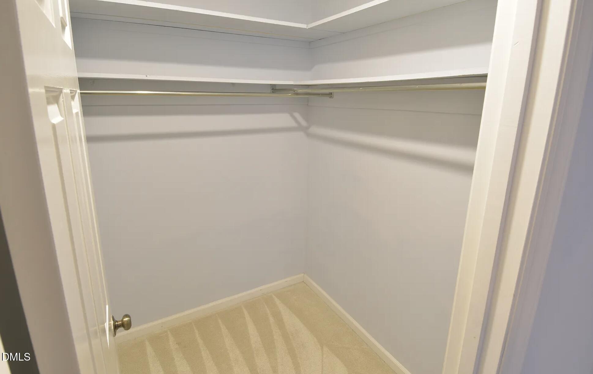 6403 Andsley Drive Raleigh, NC 27609 - Photo 19 of 21 a view of small space with racks on the wall