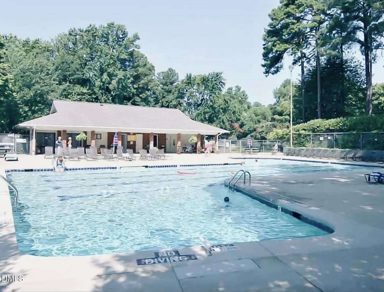 6403 Andsley Drive Raleigh, NC 27609 - Photo 21 of 21 a view of a house with a yard and sitting area