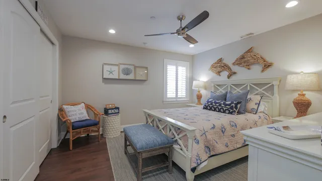 a bedroom with a bed and a chair