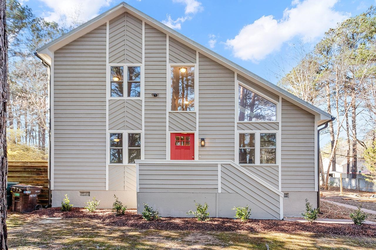 5516 Middleton Road Durham, NC 27713 - Photo 1 of 35 a view of a house with backyard