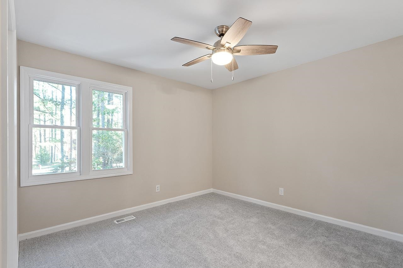 5516 Middleton Road Durham, NC 27713 - Photo 15 of 35 an empty room with a window