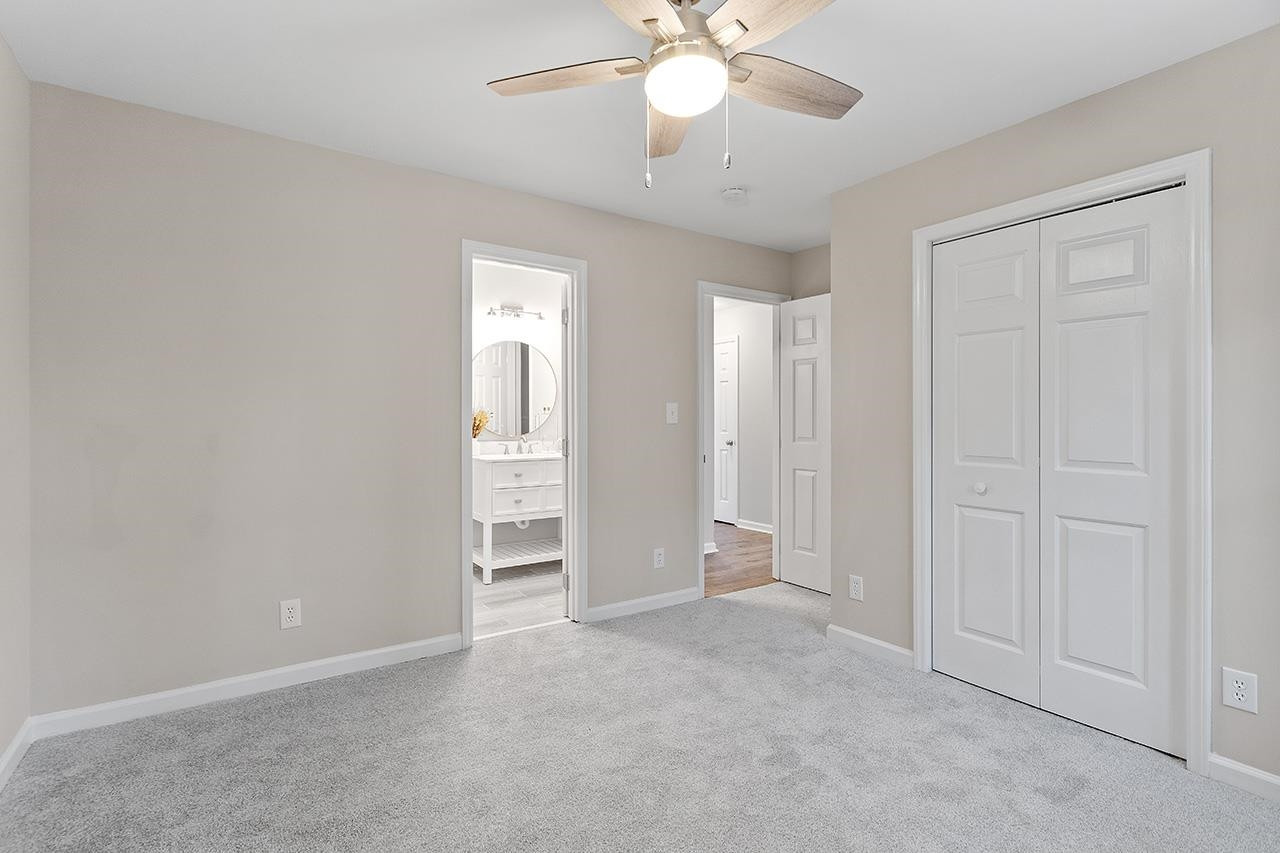 5516 Middleton Road Durham, NC 27713 - Photo 19 of 35 an empty room with fan and entrance