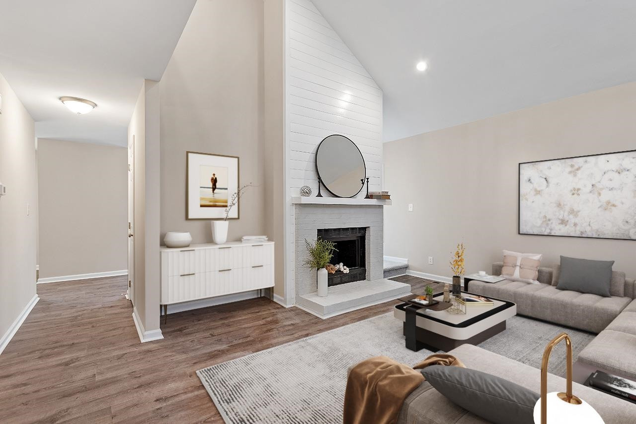 5516 Middleton Road Durham, NC 27713 - Photo 2 of 35 a living room with furniture and a fireplace