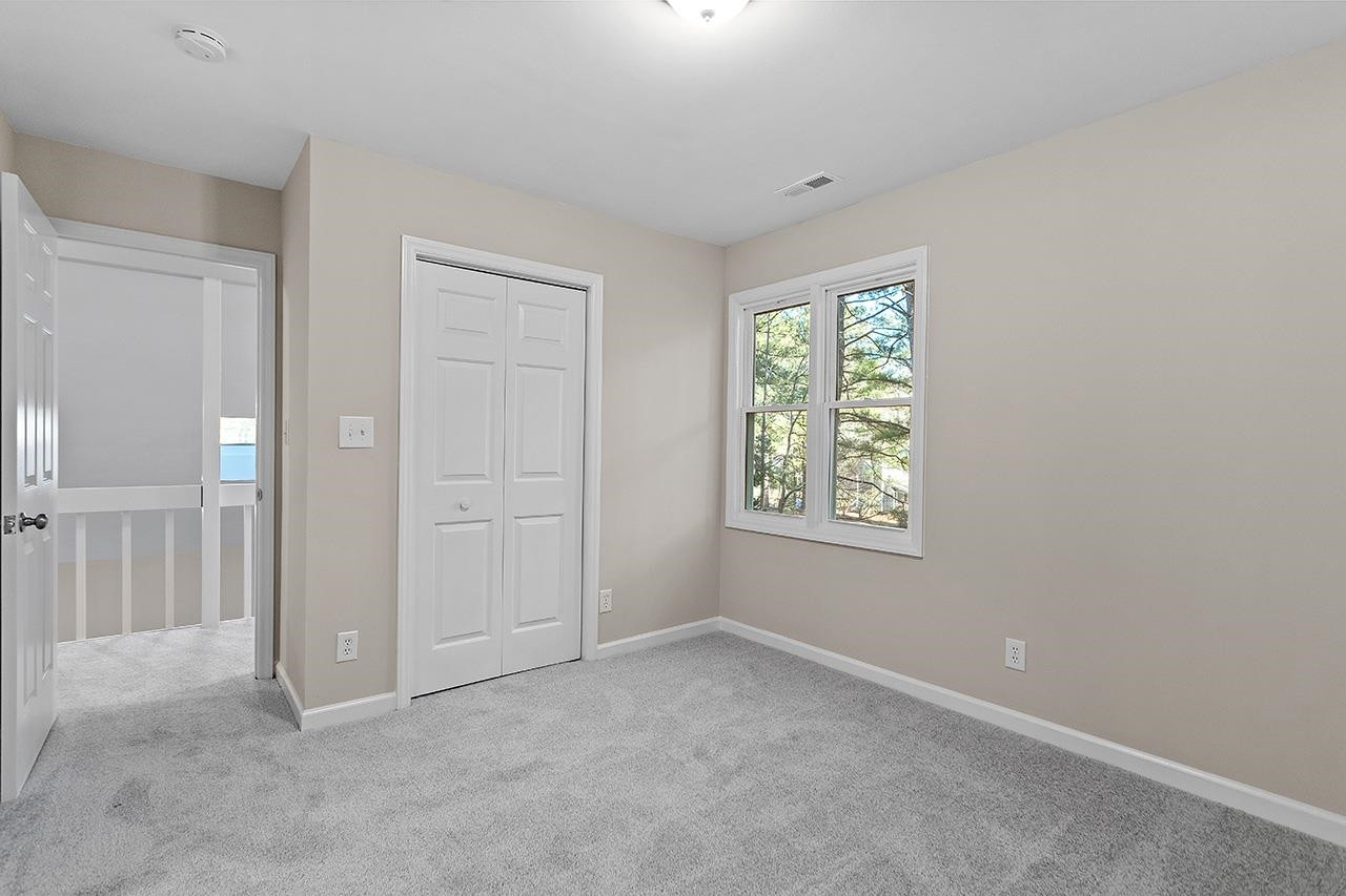 5516 Middleton Road Durham, NC 27713 - Photo 25 of 35 a view of an empty room with a window