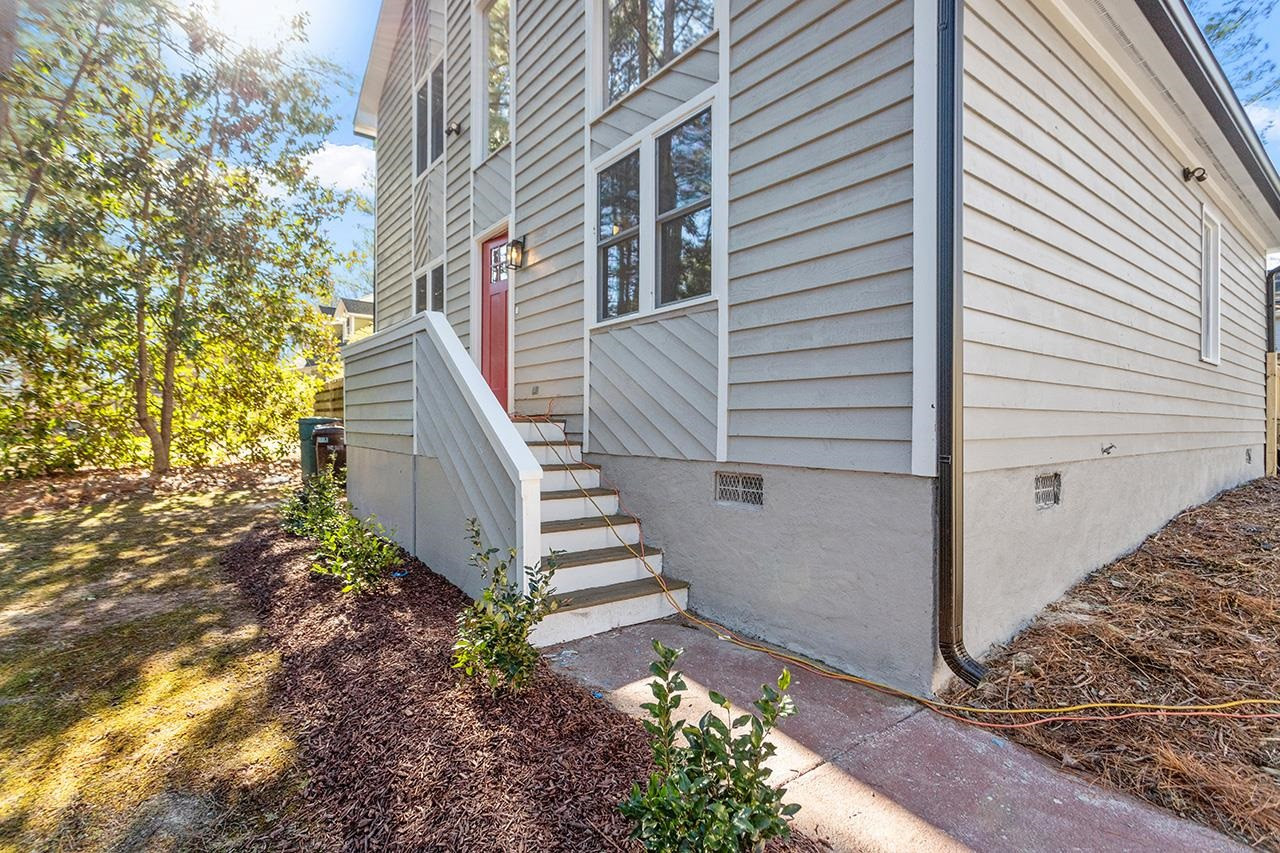 5516 Middleton Road Durham, NC 27713 - Photo 31 of 35 a view of a house with a yard