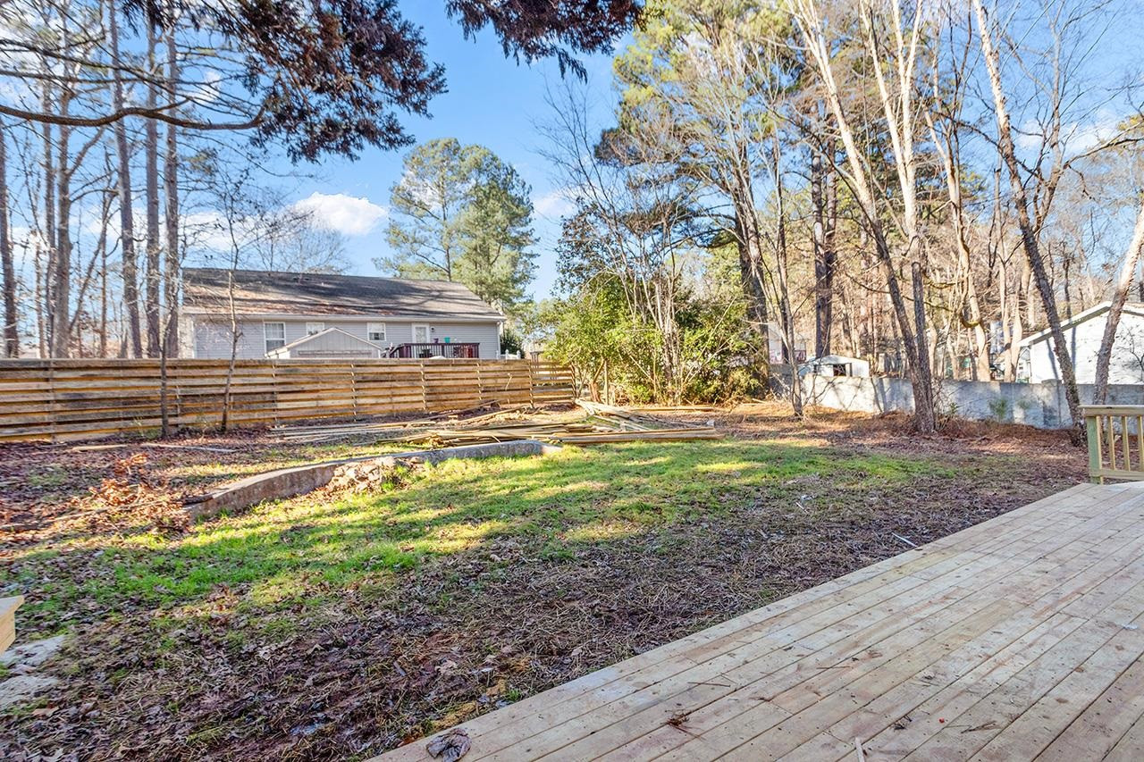 5516 Middleton Road Durham, NC 27713 - Photo 33 of 35 a view of a yard with large trees
