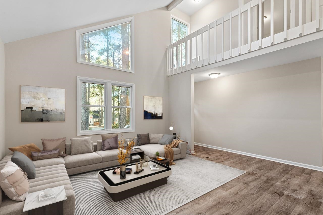 5516 Middleton Road Durham, NC 27713 - Photo 4 of 35 a living room with furniture couches and a window