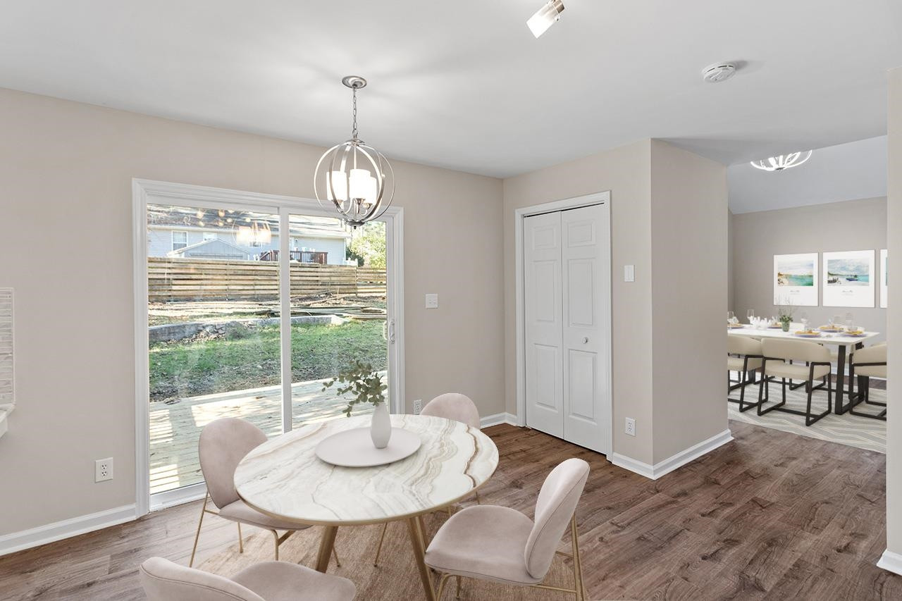 5516 Middleton Road Durham, NC 27713 - Photo 5 of 35 a view of a dining room with furniture window and outside view