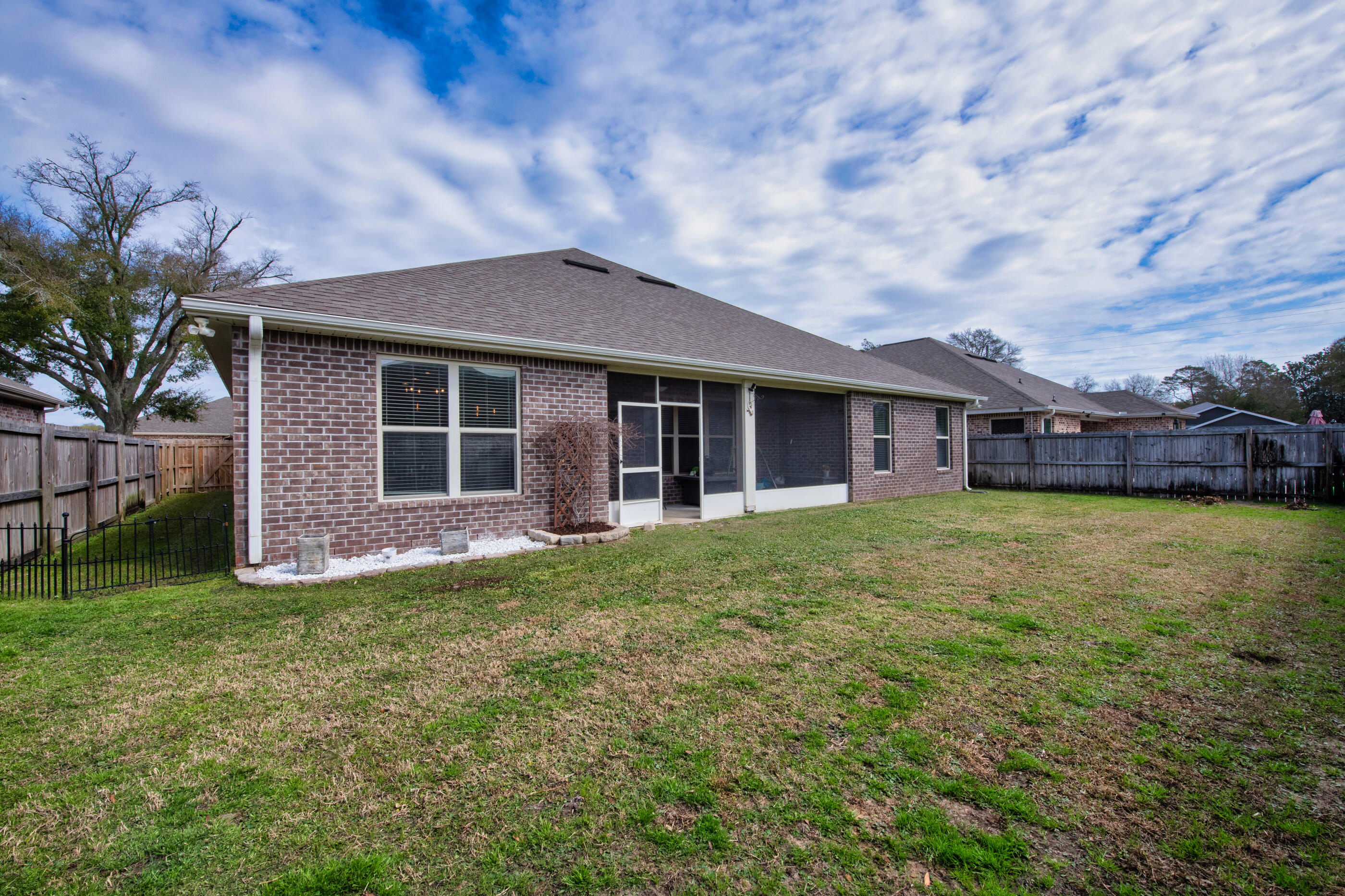 2394 Ellison Way Fort Walton Beach, FL 32547 - Photo 26 of 28 a front view of house with yard and green space