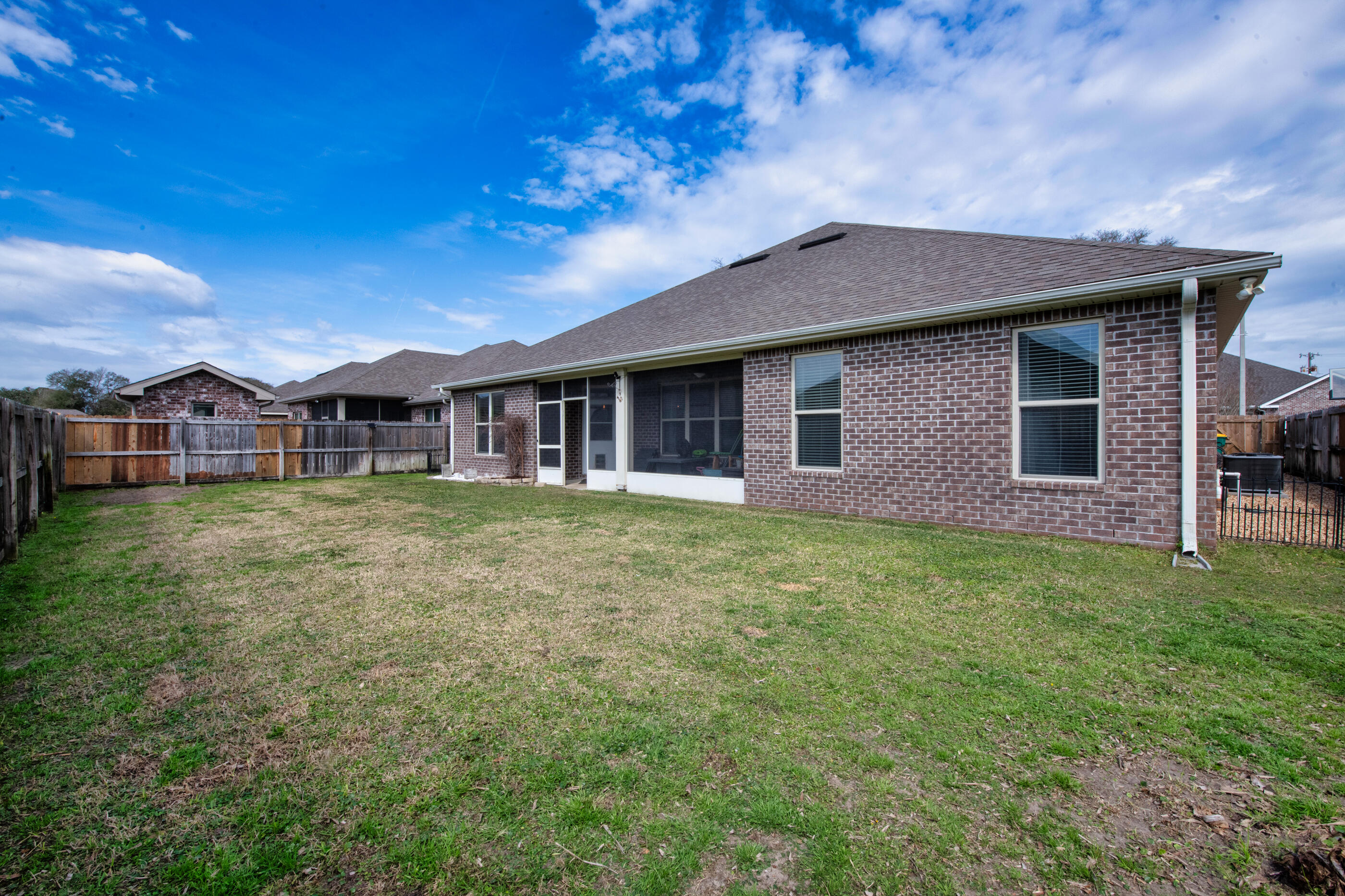 2394 Ellison Way Fort Walton Beach, FL 32547 - Photo 27 of 28 a front view of a house with garden