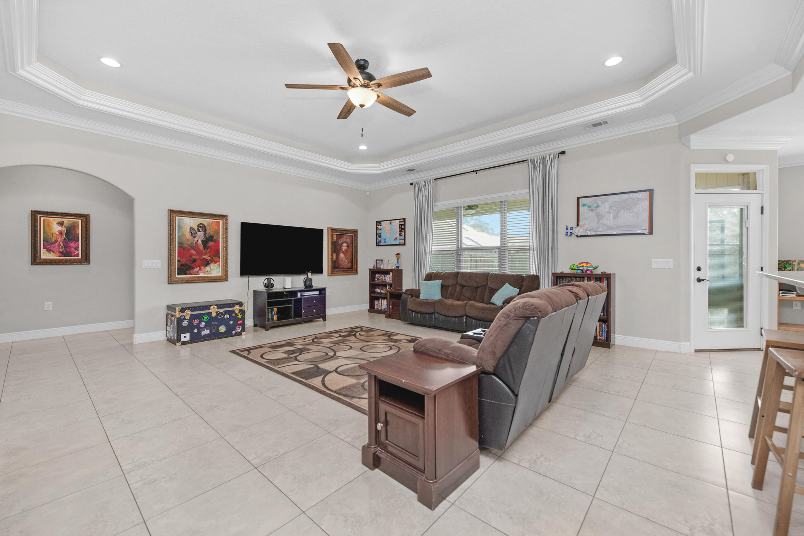 2394 Ellison Way Fort Walton Beach, FL 32547 - Photo 8 of 28 a living room with furniture and a flat screen tv