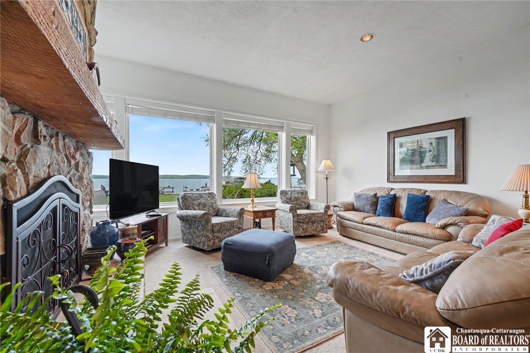 4568 Warners Bay Road Ellery, NY 14712 - Photo 15 of 43 This family room is a perfect place for relaxing a