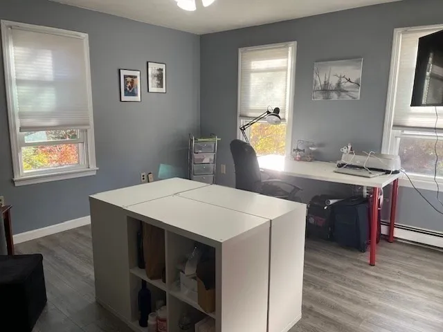 a kitchen that has a table and chair in it