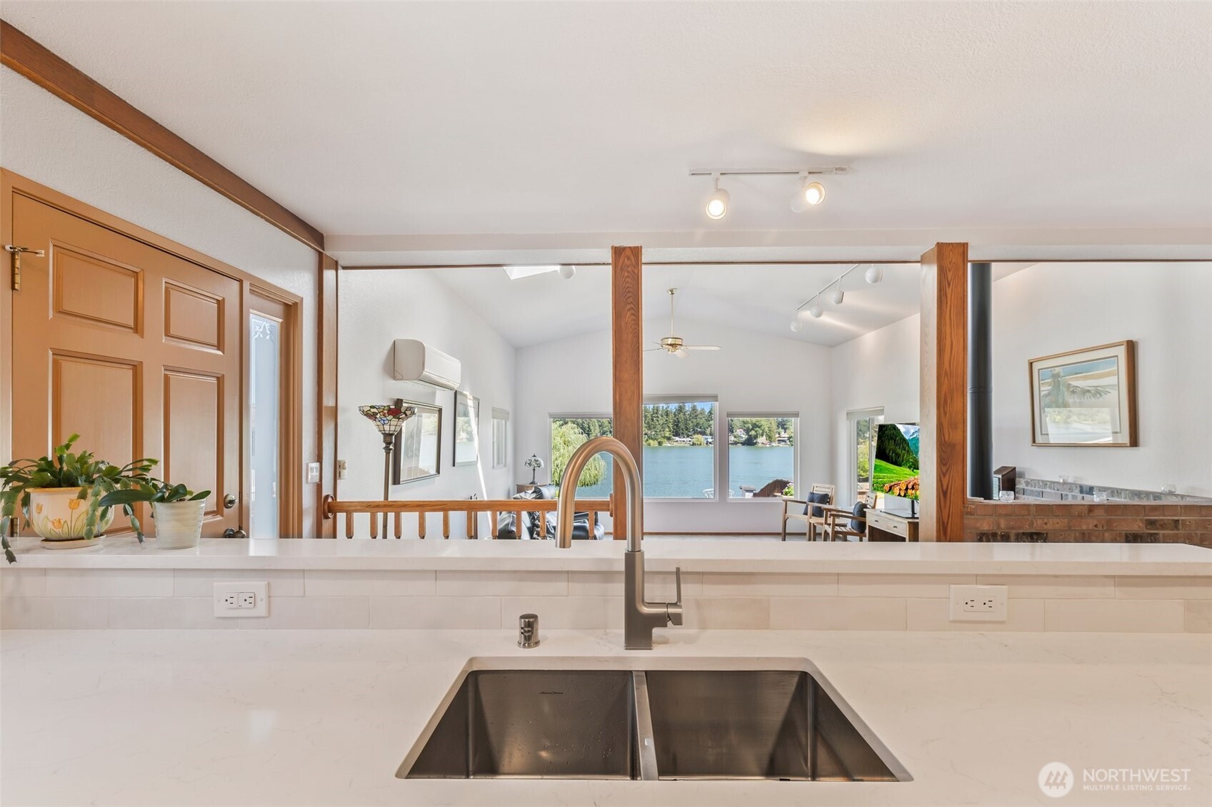 1207 Creso Road South Spanaway, WA 98387 - Photo 12 of 40 a kitchen with a sink and a window