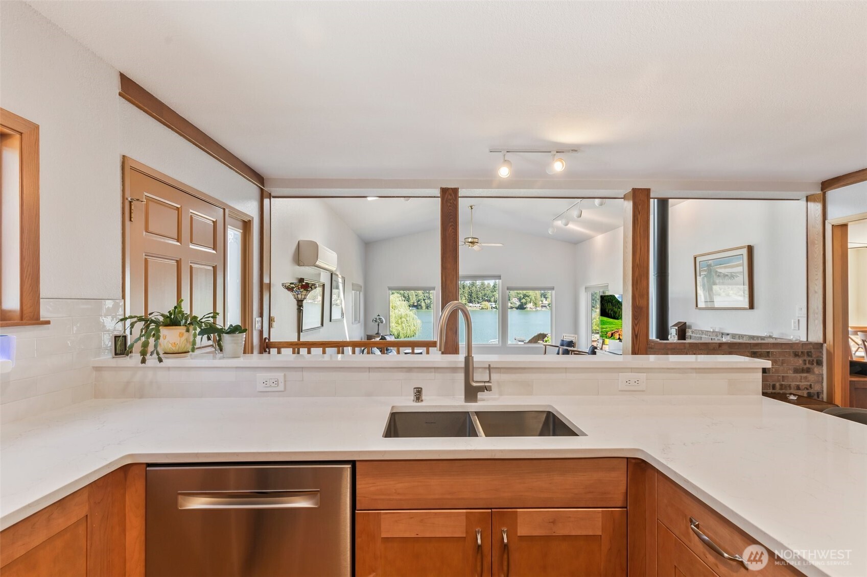1207 Creso Road South Spanaway, WA 98387 - Photo 15 of 40 a kitchen with a sink and a refrigerator