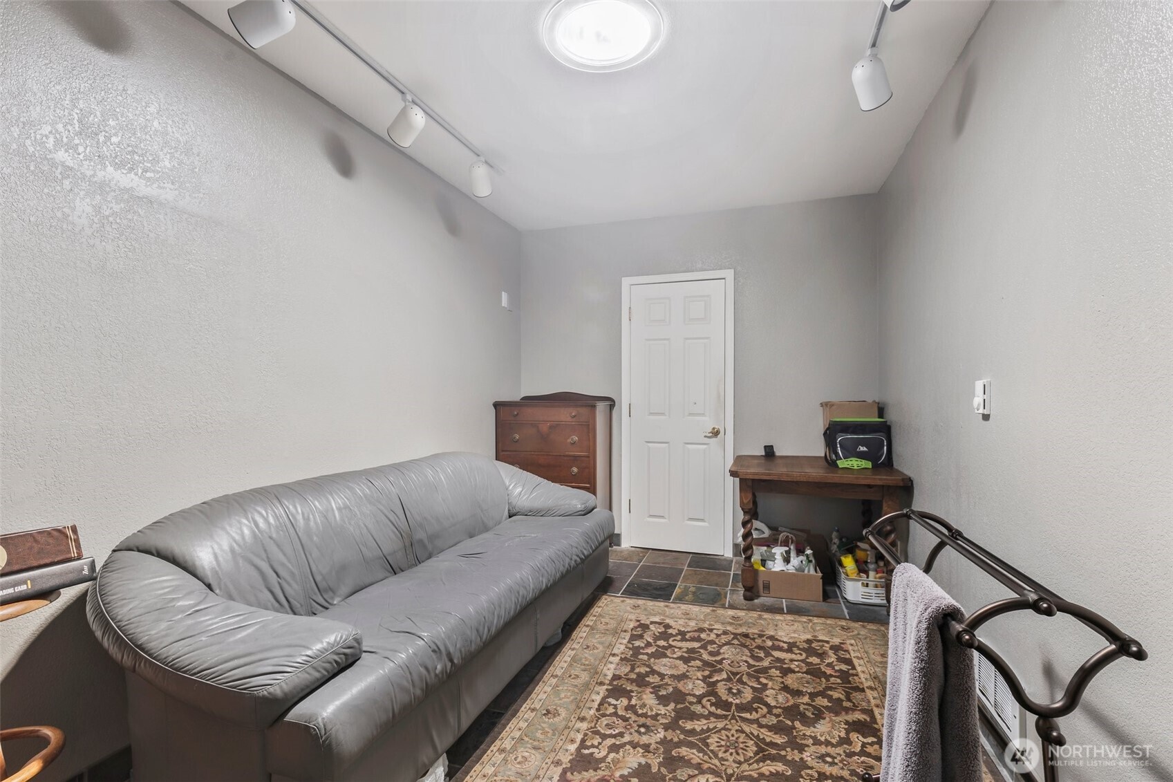 1207 Creso Road South Spanaway, WA 98387 - Photo 16 of 40 a living room with furniture and a rug