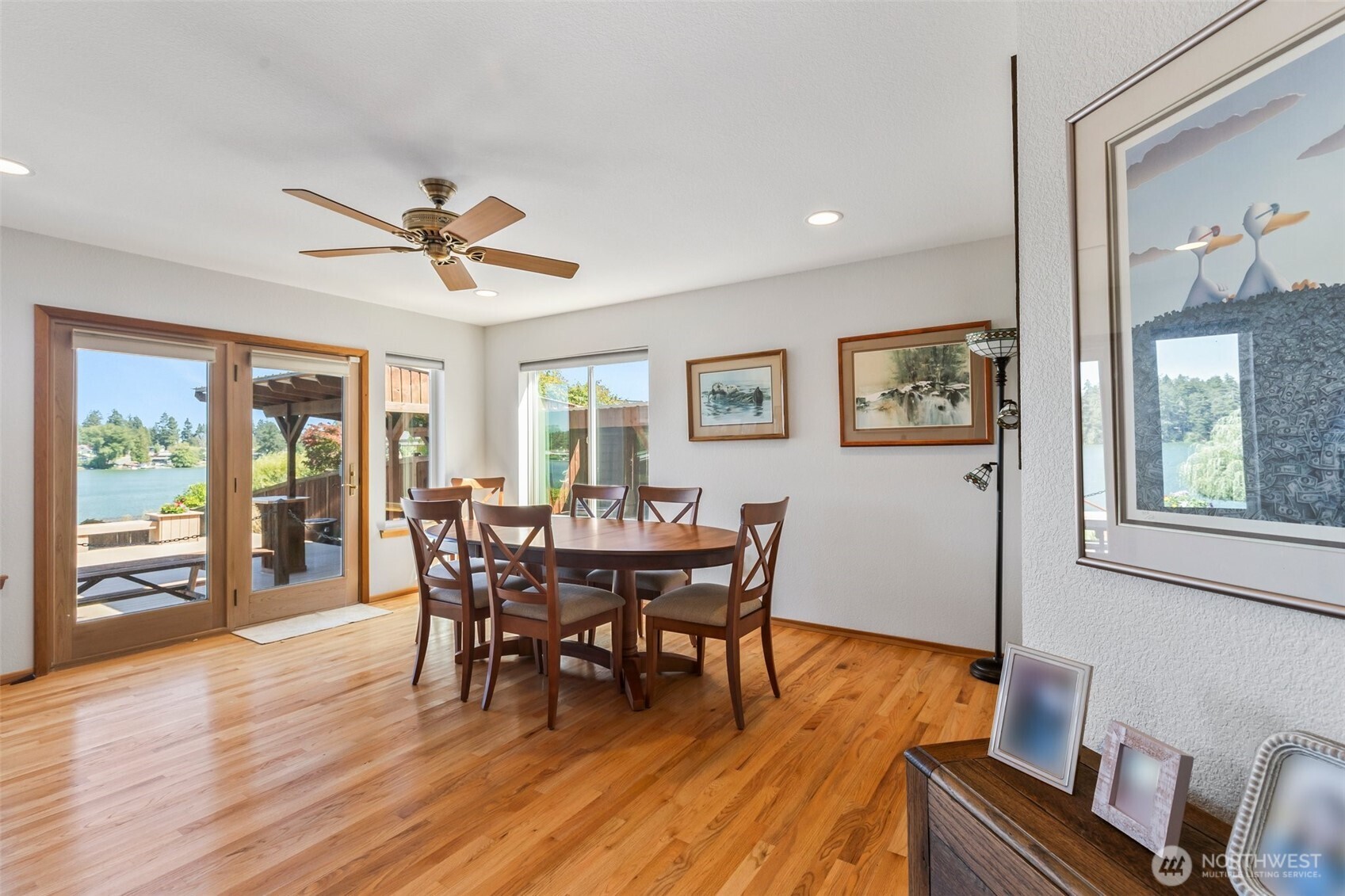 1207 Creso Road South Spanaway, WA 98387 - Photo 17 of 40 a view of a dining room with furniture window and wooden floor