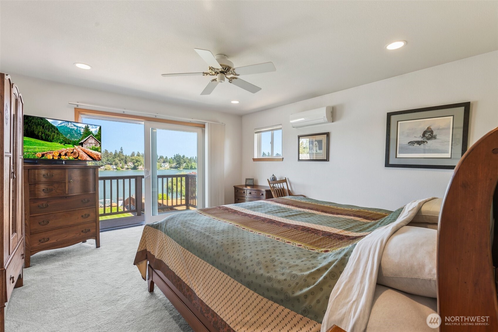 1207 Creso Road South Spanaway, WA 98387 - Photo 30 of 40 a bedroom with a bed and a large window