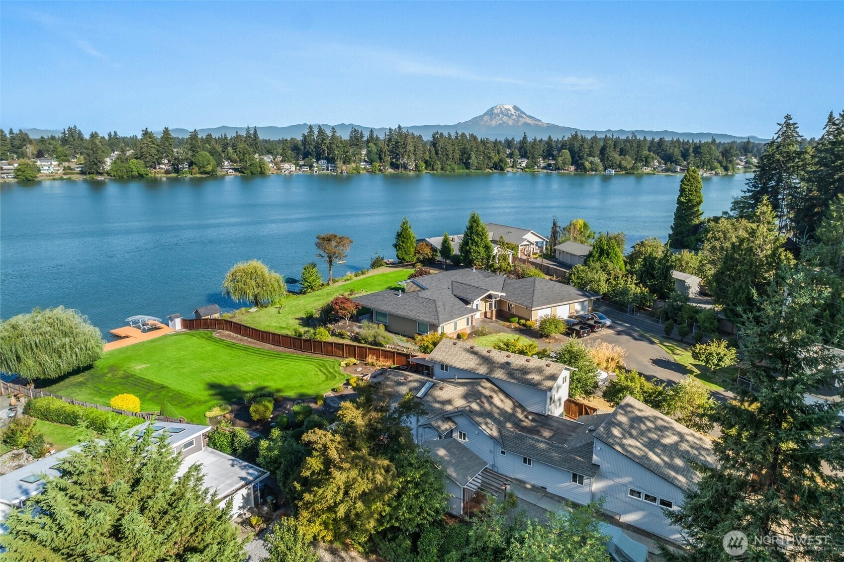 1207 Creso Road South Spanaway, WA 98387 - Photo 3 of 40 a view of a lake with a city