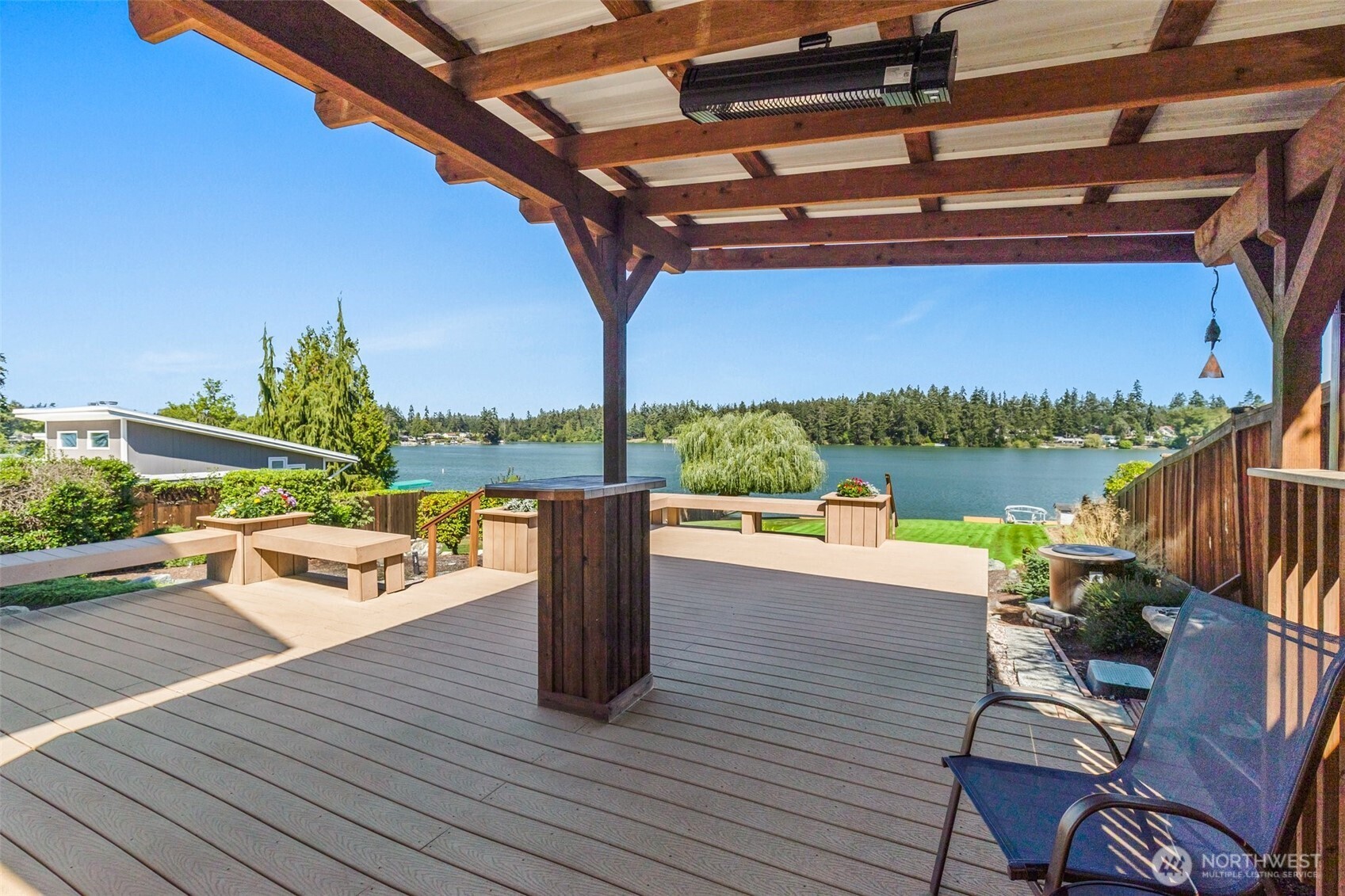 1207 Creso Road South Spanaway, WA 98387 - Photo 35 of 40 a view of a roof deck with couches and wooden floor