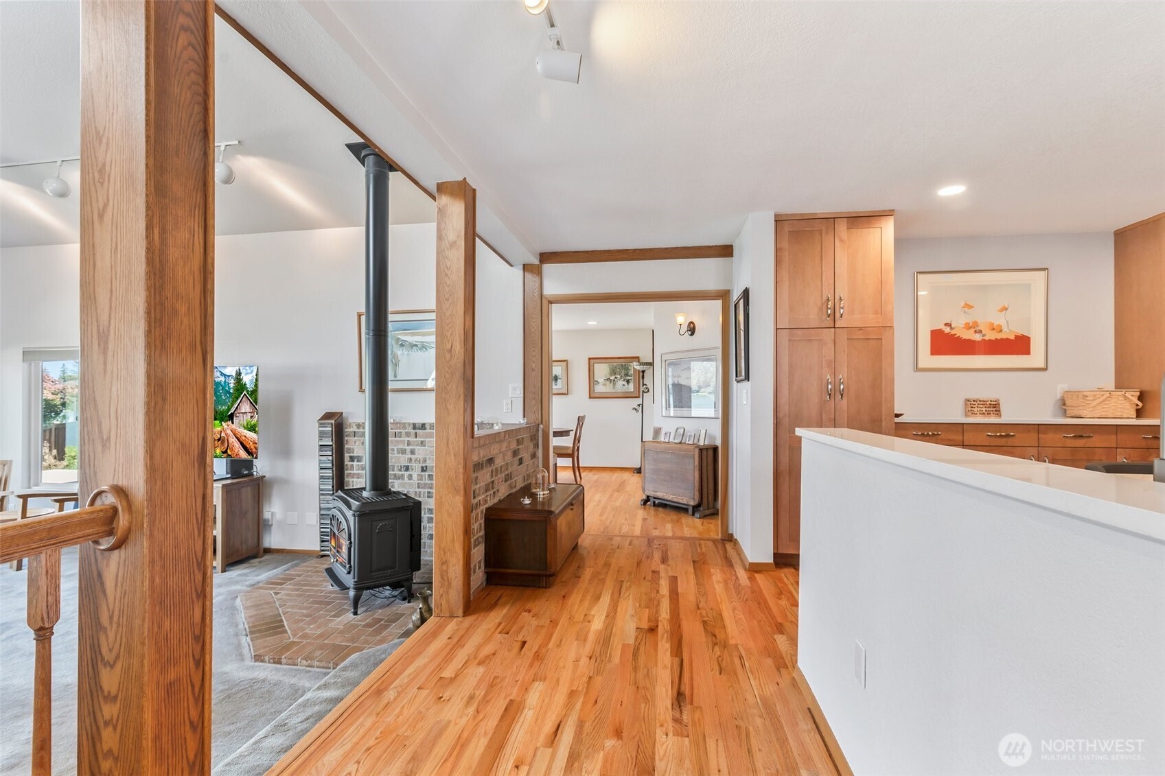 1207 Creso Road South Spanaway, WA 98387 - Photo 6 of 40 a view of a living room hardwood floor and a kitchen