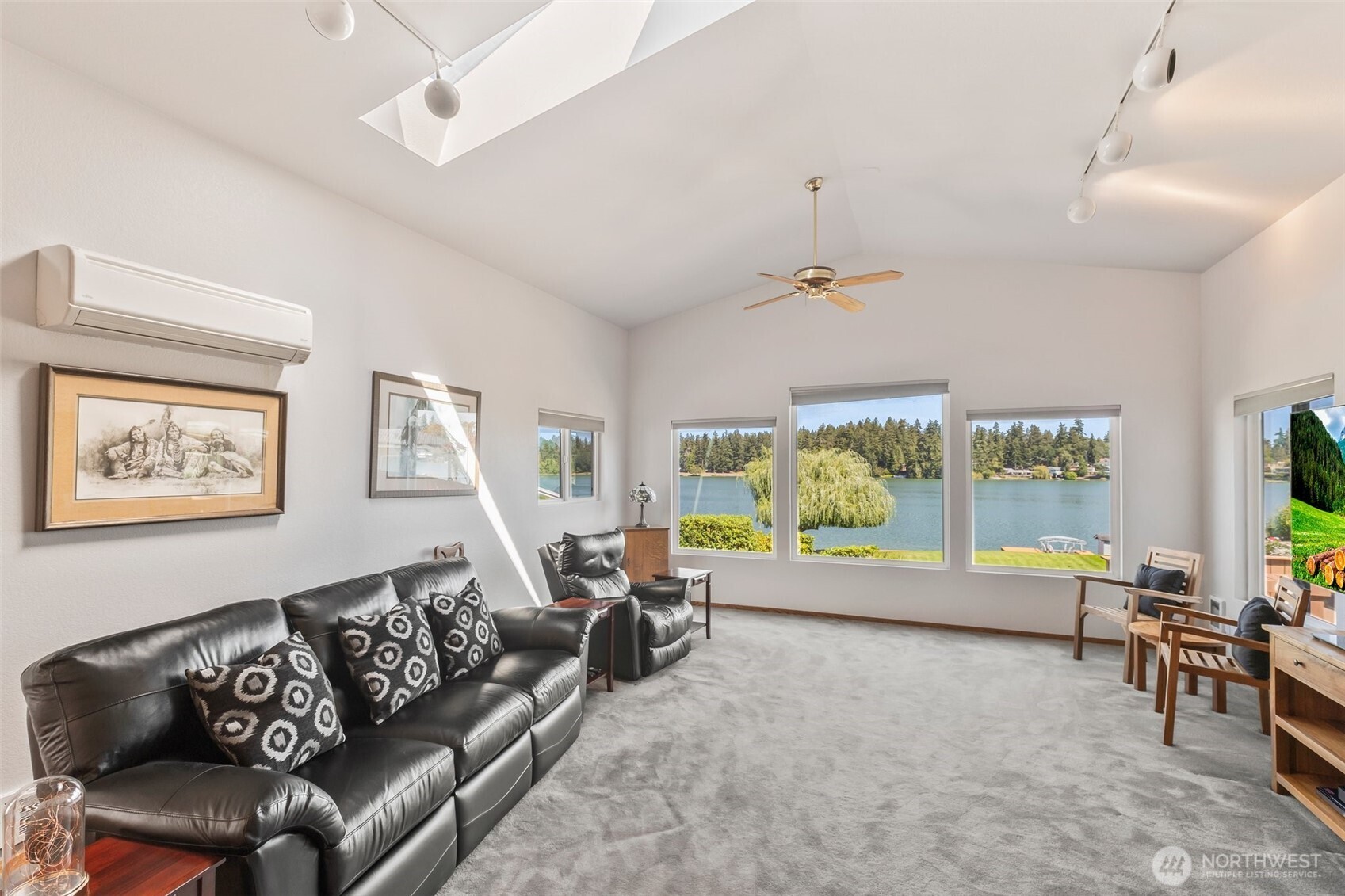 1207 Creso Road South Spanaway, WA 98387 - Photo 7 of 40 a living room with furniture and a flat screen tv