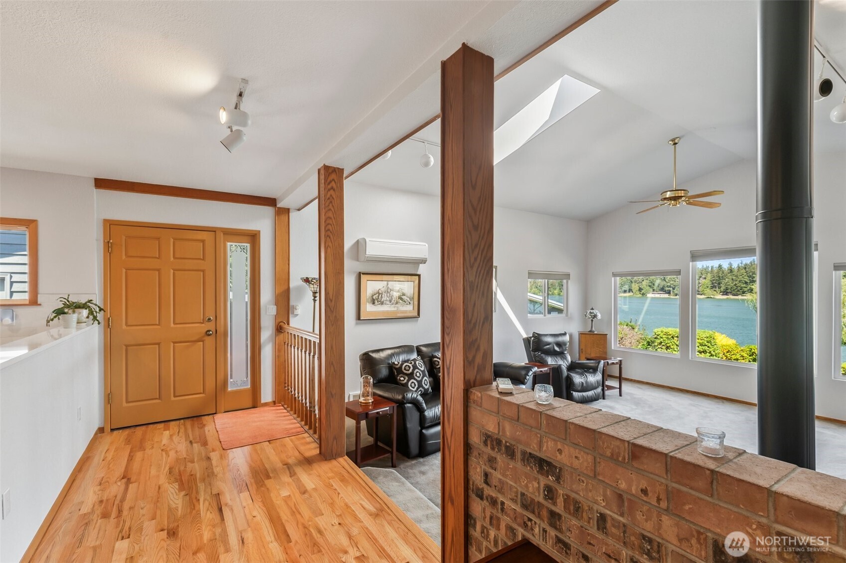 1207 Creso Road South Spanaway, WA 98387 - Photo 10 of 40 a view of a bedroom with furniture and a large window