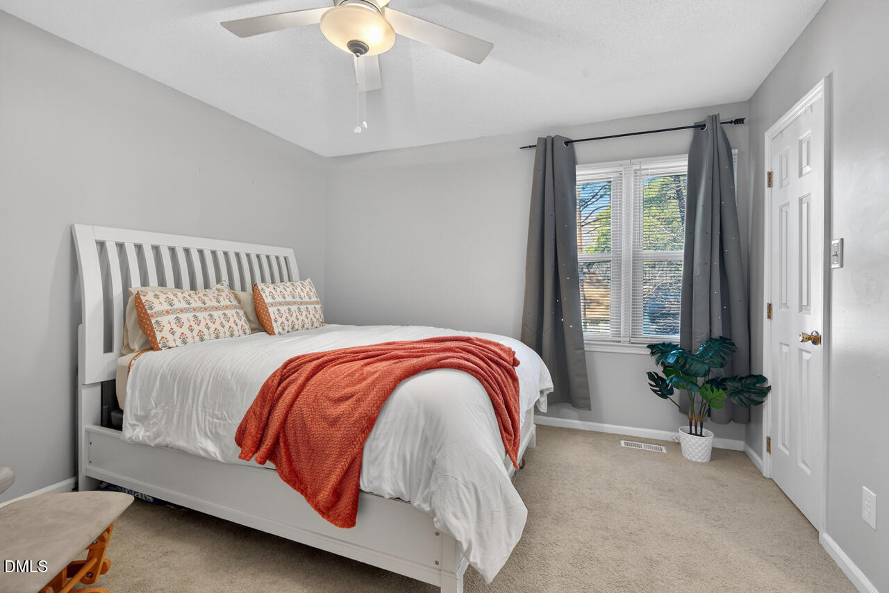 704 Benchmark Drive Raleigh, NC 27615 - Photo 22 of 39 Bedroom 2