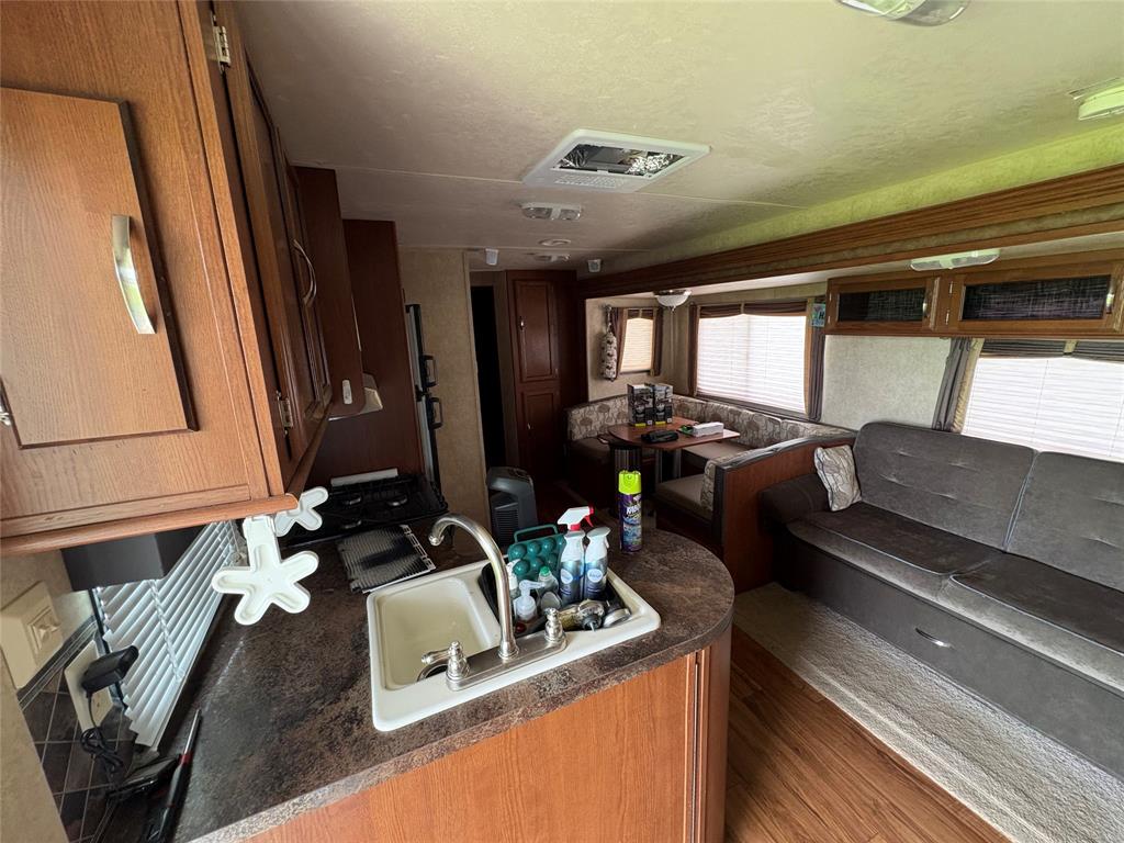 217 Wichita Quitman, TX 75783 - Photo 6 of 17 a view of a room with gym equipment