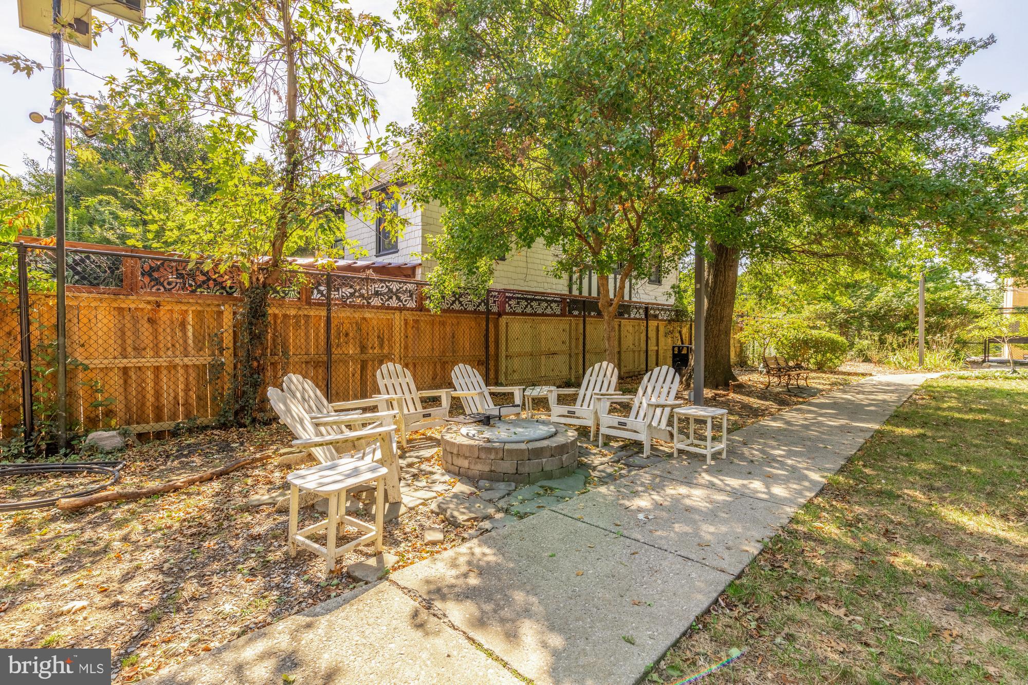 3022 Wisconsin Avenue Northwest, Unit 208 Washington, DC 20016 - Photo 20 of 24 a view of a lake with tables and chairs