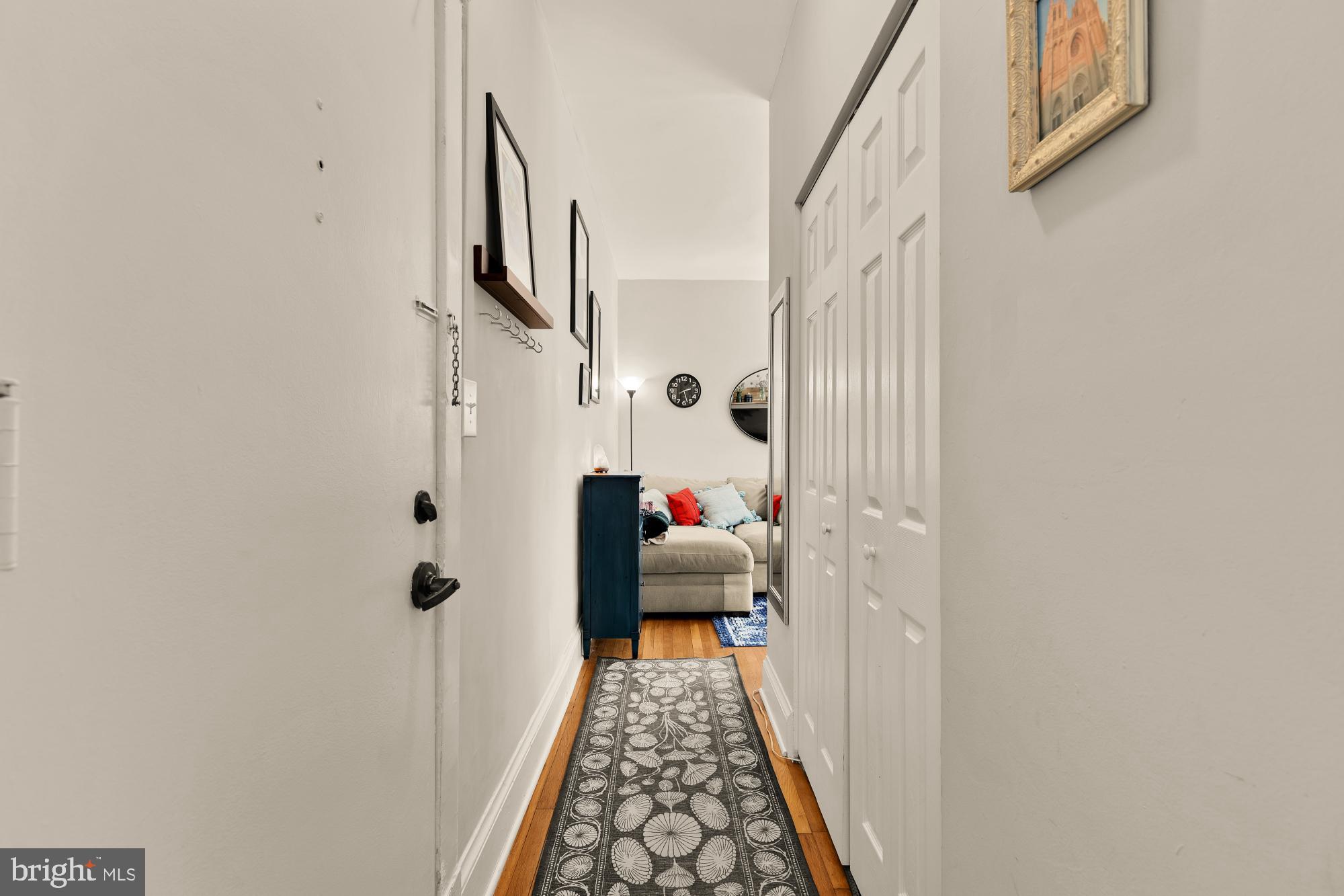 3022 Wisconsin Avenue Northwest, Unit 208 Washington, DC 20016 - Photo 4 of 24 a view of an entryway with wooden floor