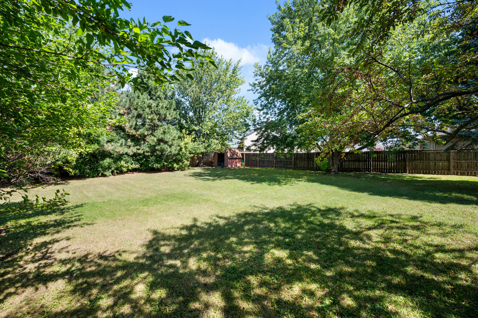 649 Fox Hollow Court DeKalb, IL 60115 - Photo 7 of 38 a view of outdoor space with deck and yard