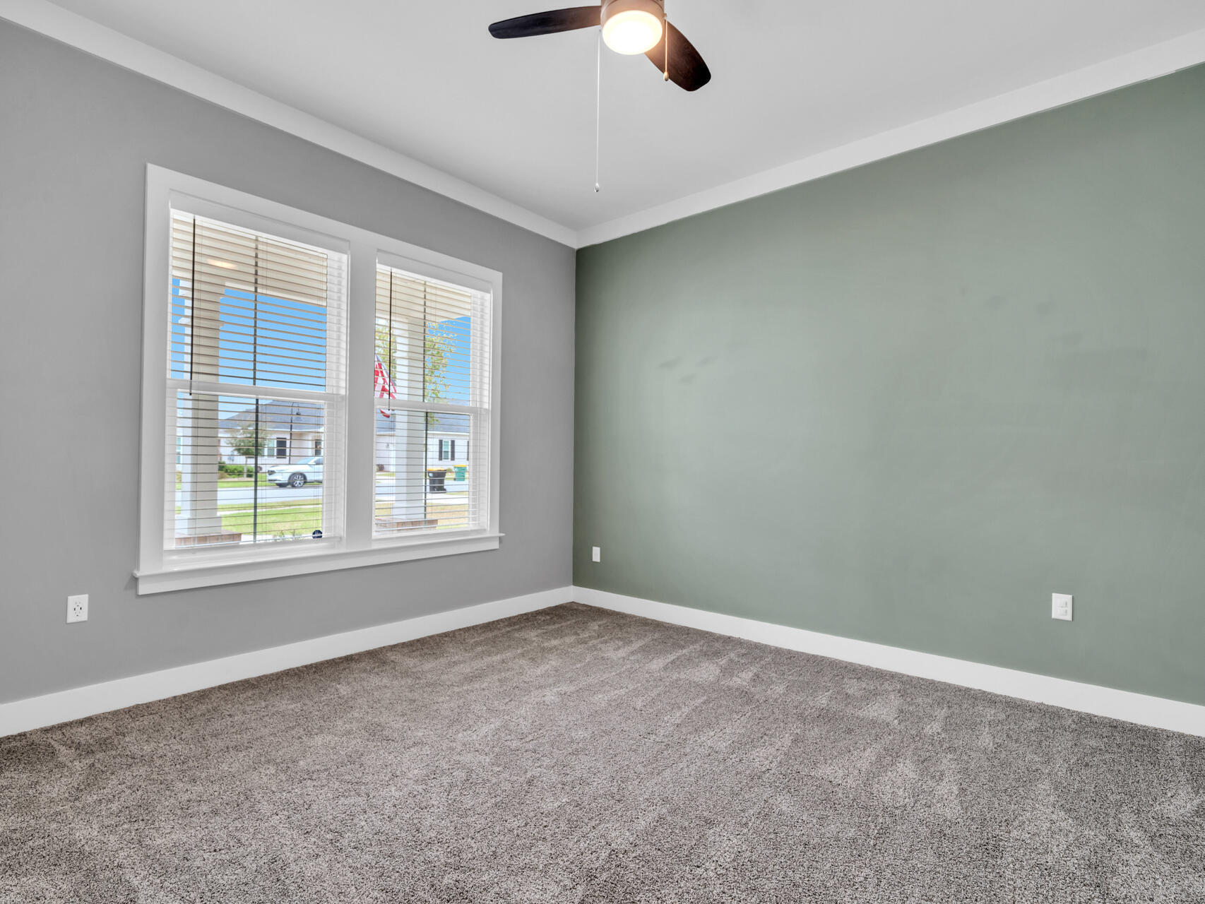 1160 Deer Moss Loop Niceville, FL 32578 - Photo 17 of 60 an empty room with fan and windows