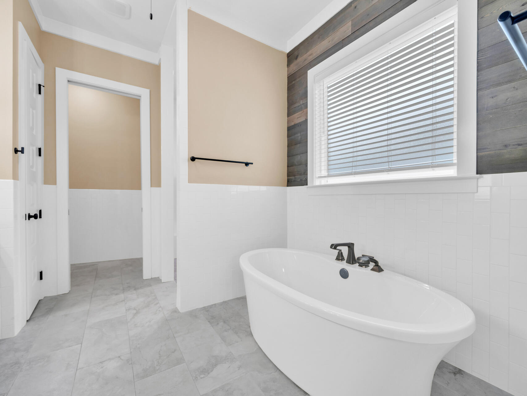 1160 Deer Moss Loop Niceville, FL 32578 - Photo 28 of 60 a white bath tub sitting in a bathroom