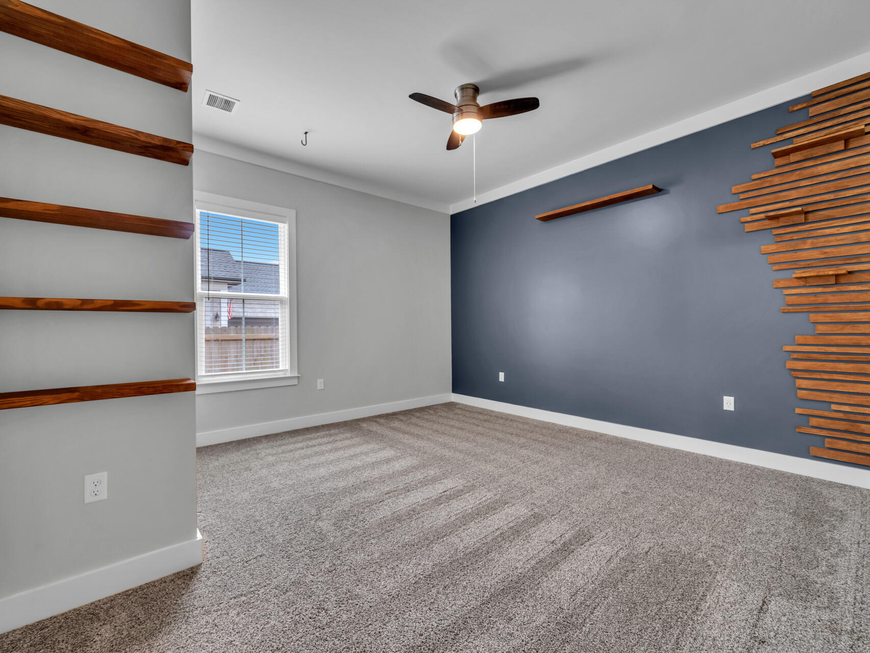 1160 Deer Moss Loop Niceville, FL 32578 - Photo 30 of 60 a view of an empty room with a window