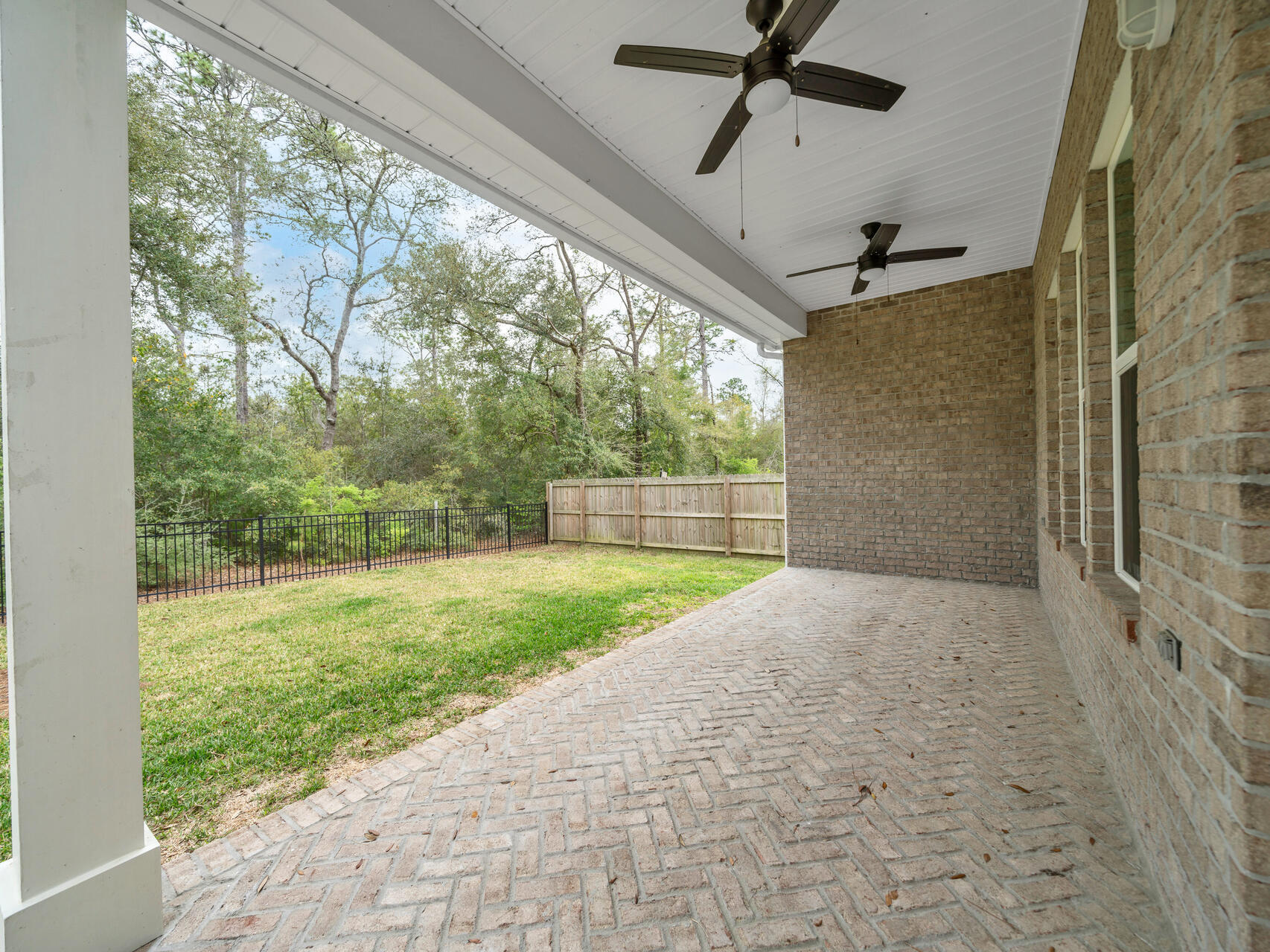 1160 Deer Moss Loop Niceville, FL 32578 - Photo 37 of 60 a view of a porch with a backyard