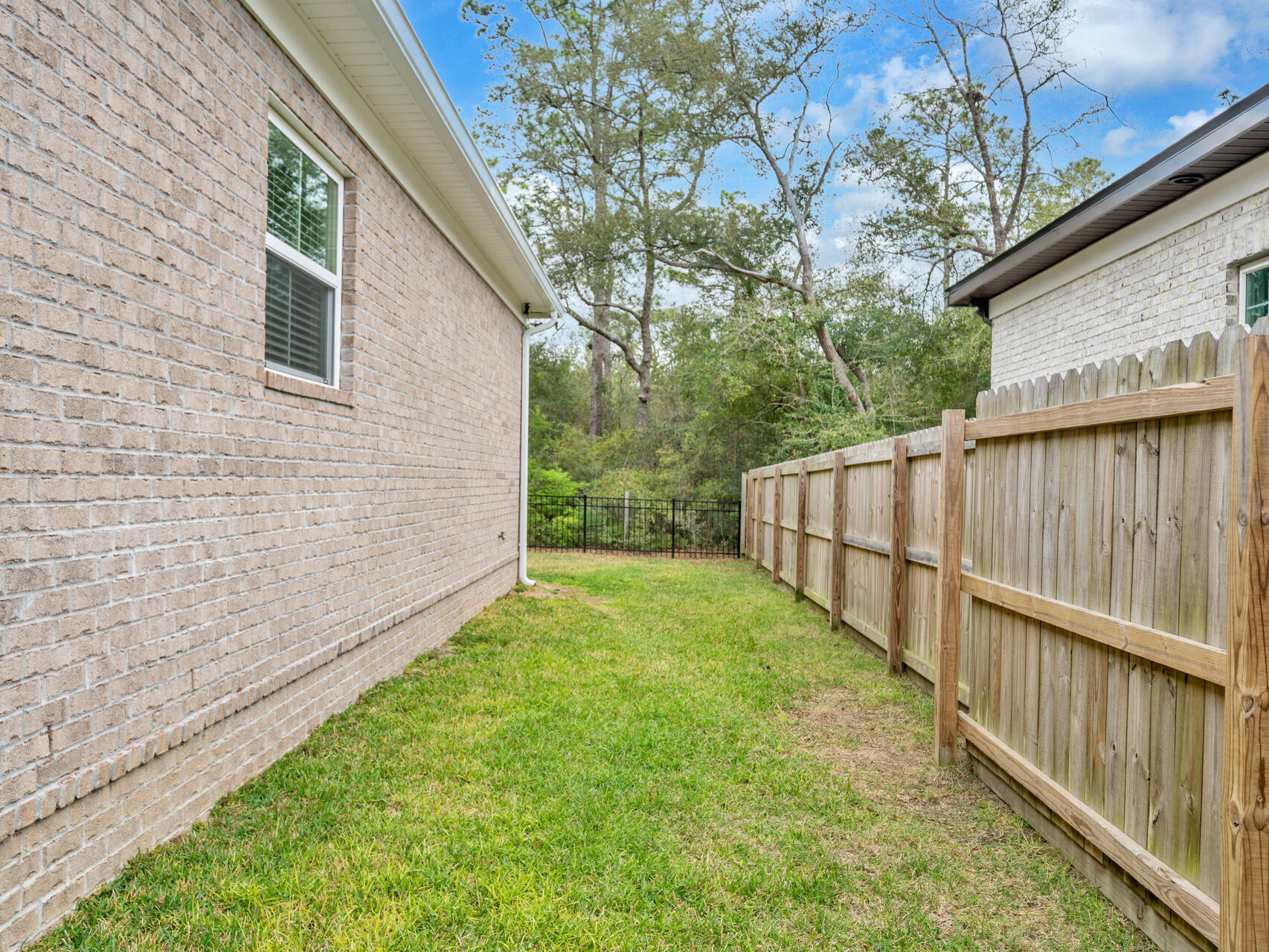 1160 Deer Moss Loop Niceville, FL 32578 - Photo 38 of 60 a view of backyard with green space