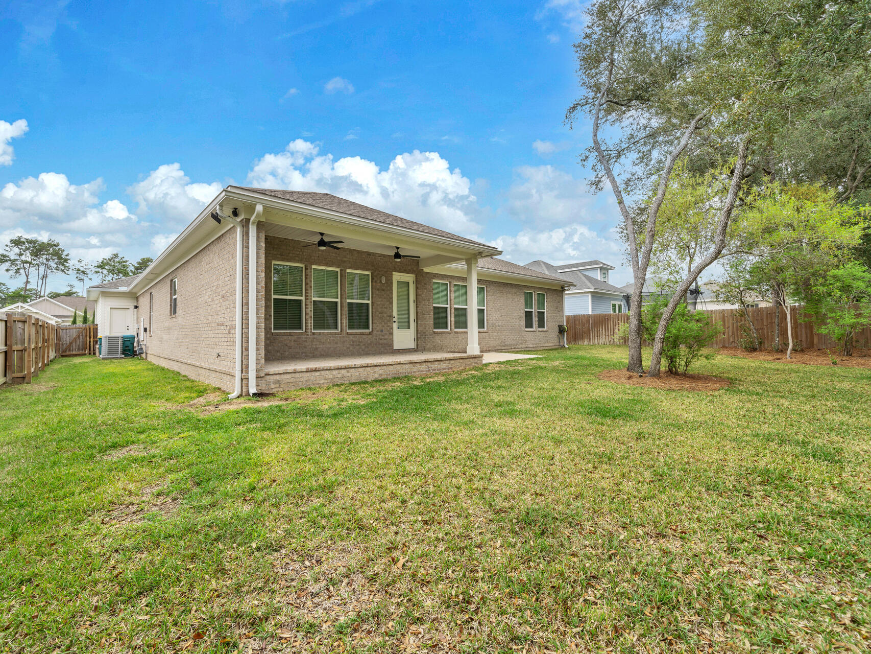 1160 Deer Moss Loop Niceville, FL 32578 - Photo 39 of 60 a view of a house with a yard