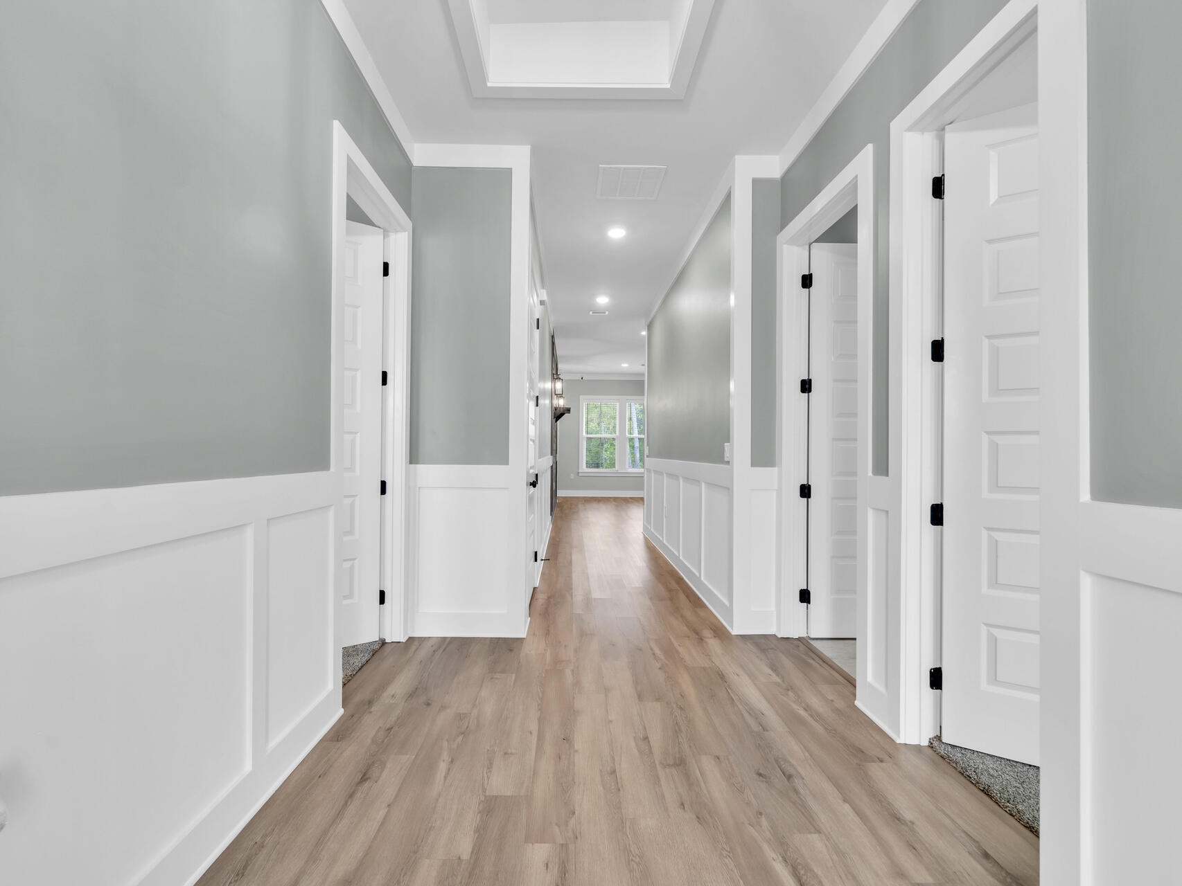 1160 Deer Moss Loop Niceville, FL 32578 - Photo 5 of 60 a view of a hallway with wooden floor