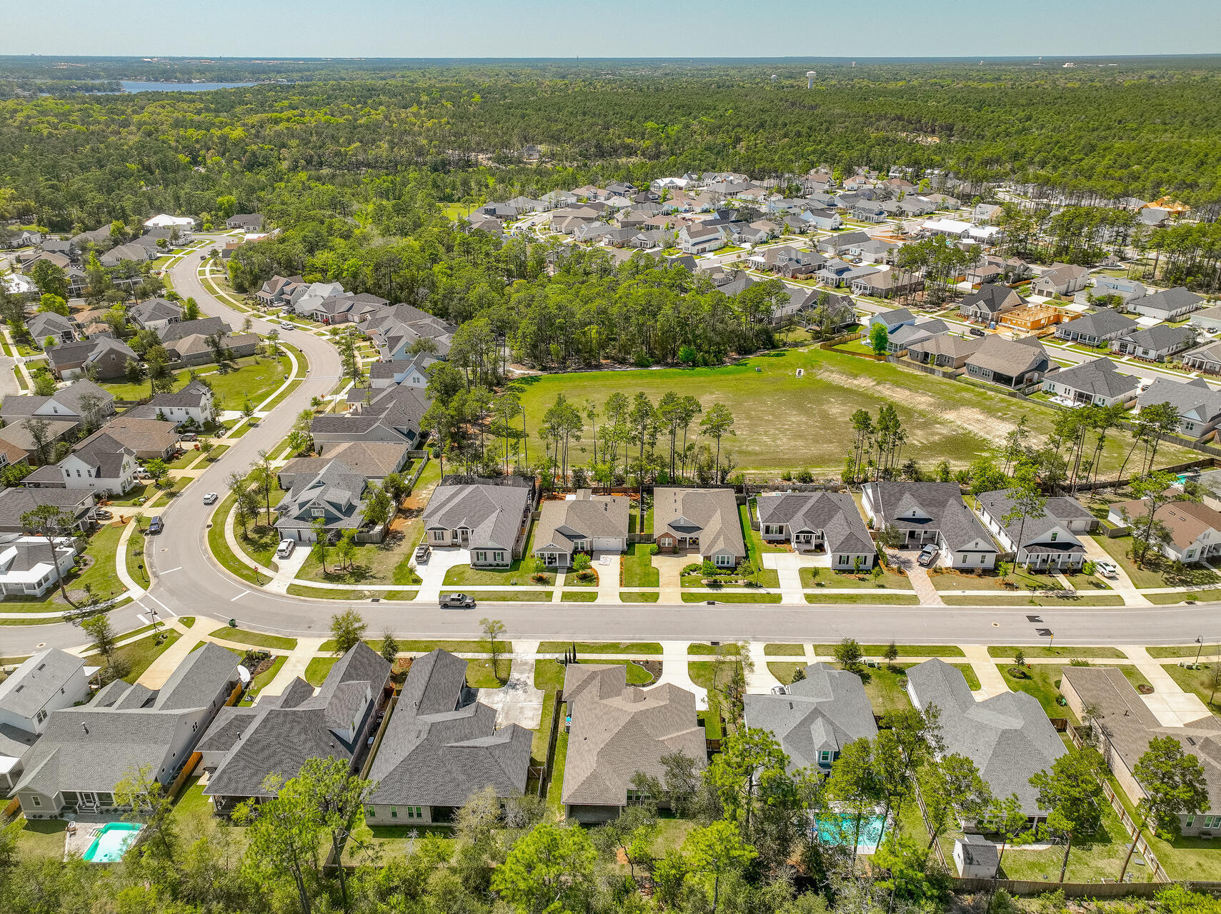 1160 Deer Moss Loop Niceville, FL 32578 - Photo 51 of 60 an aerial view of residential houses with outdoor space