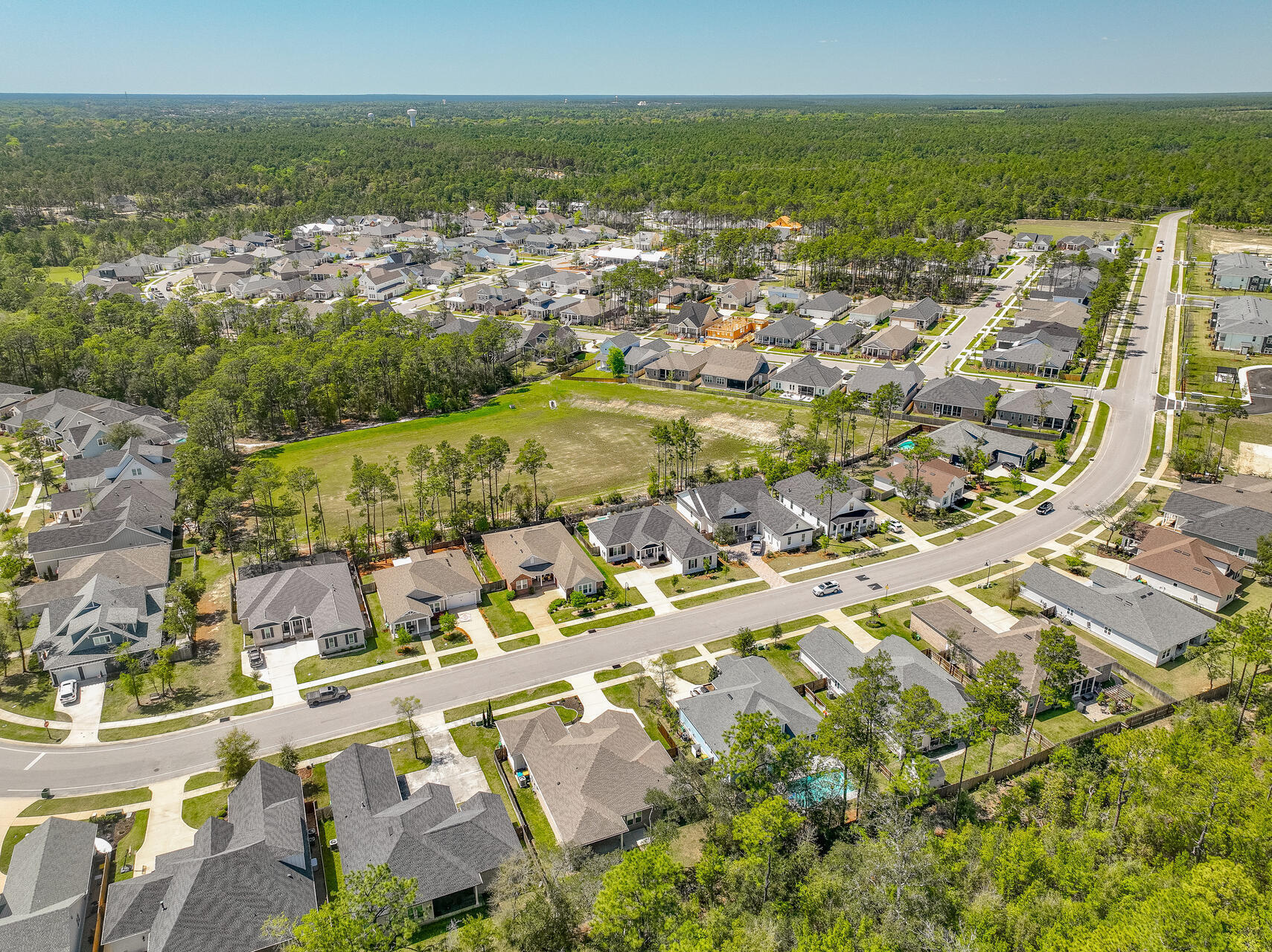 1160 Deer Moss Loop Niceville, FL 32578 - Photo 52 of 60 an aerial view of residential building and lake