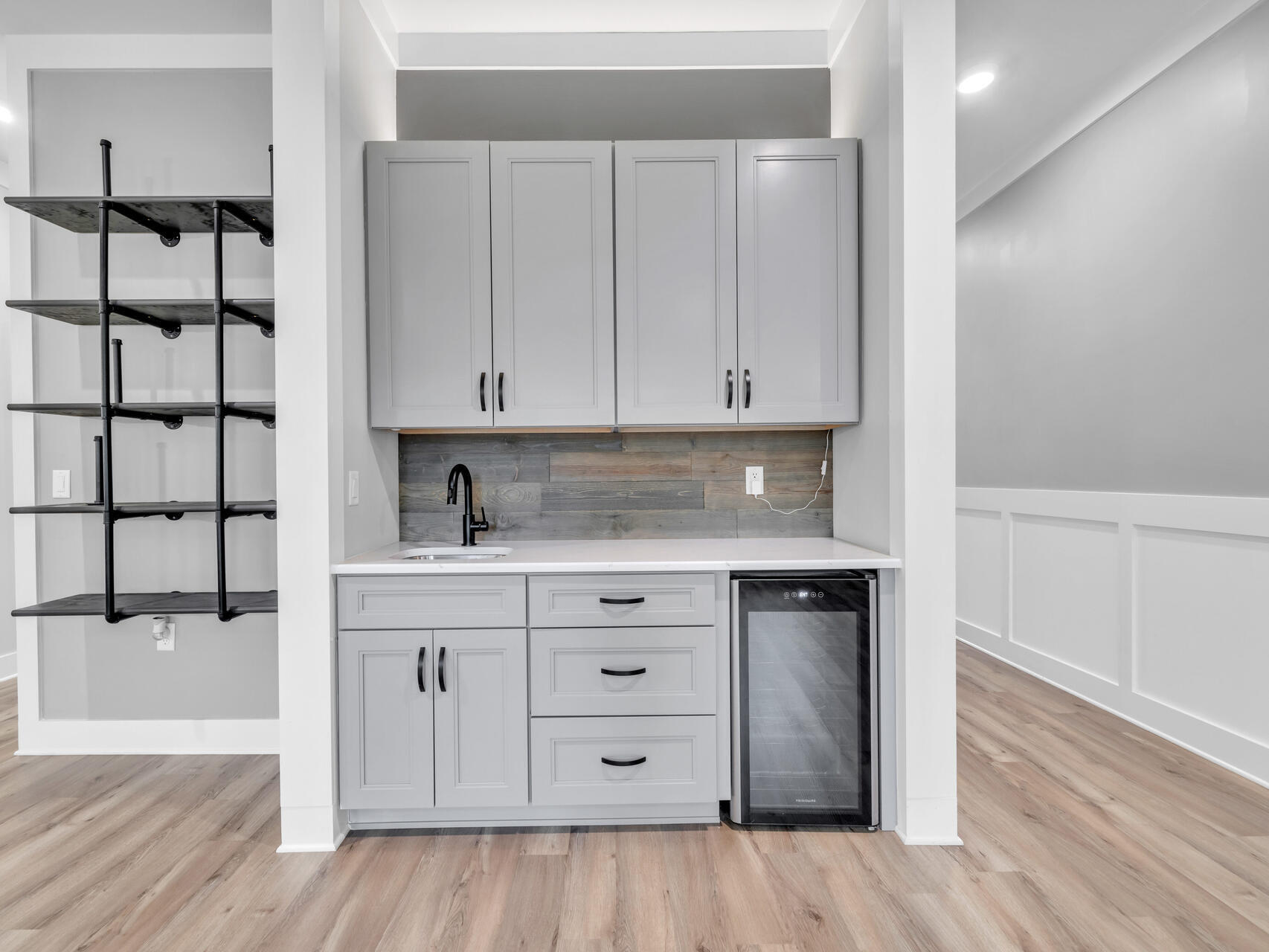 1160 Deer Moss Loop Niceville, FL 32578 - Photo 7 of 60 a kitchen with granite countertop white cabinets and sink