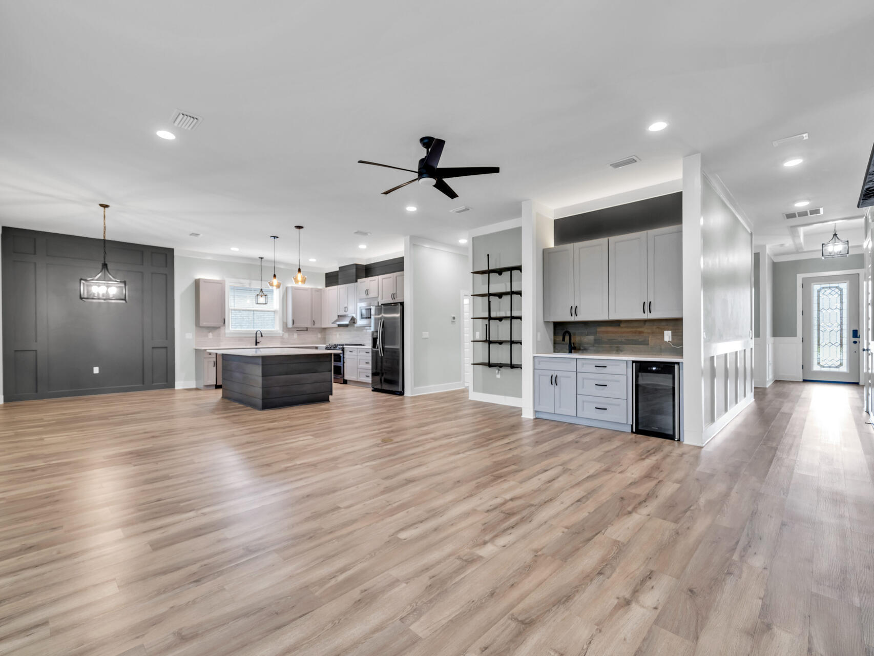 1160 Deer Moss Loop Niceville, FL 32578 - Photo 10 of 60 a view of kitchen with cabinets and wooden floor