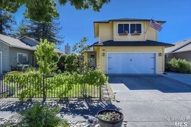 1971 Seville Street Santa Rosa, CA 95403 - Photo 1 of 1 a front view of a house with a yard