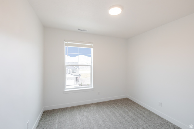 693 West 4500th South, Unit O302 Mapleton, UT 84664 - Photo 5 of 16 Spare room with light colored carpet and baseboards